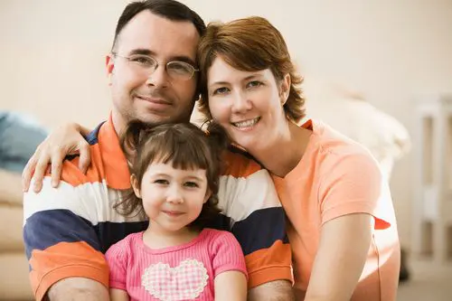 Portrait of parents and daughter